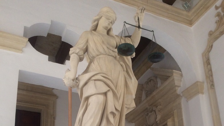 lady justice, with scales, as a statue in Malta