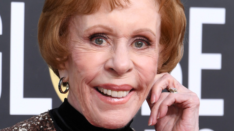 Carol Burnett tugs her ear