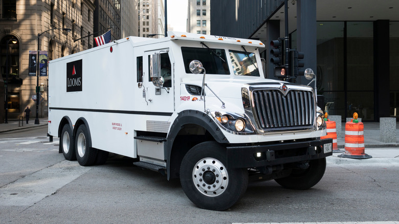 Loomis armored car on city street