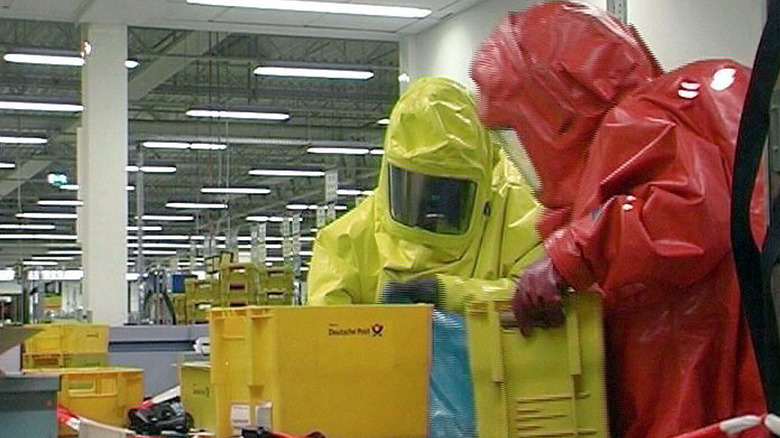 hazmat crew checking mail for anthrax