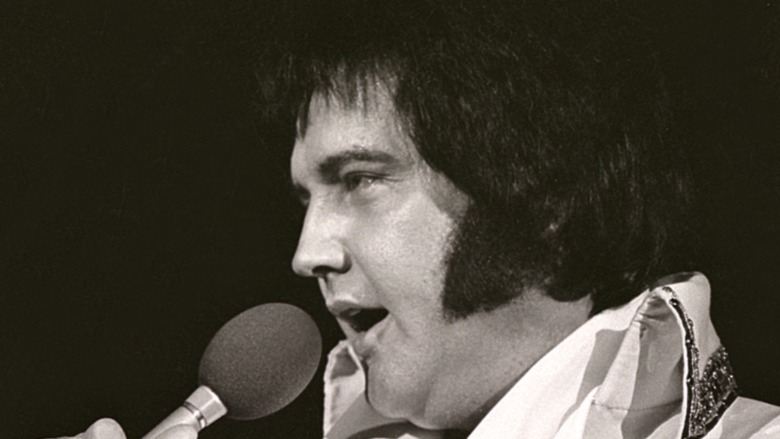 Elvis performing on stage