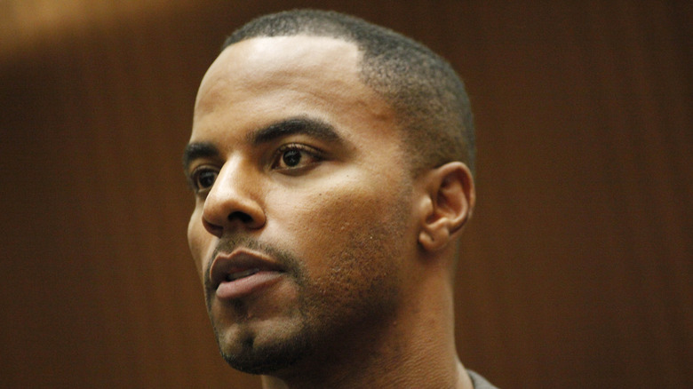 Darren Sharper looking serious courtroom