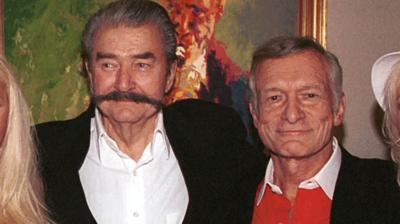 LeRoy Neiman and Hugh Hefner, both smiling 