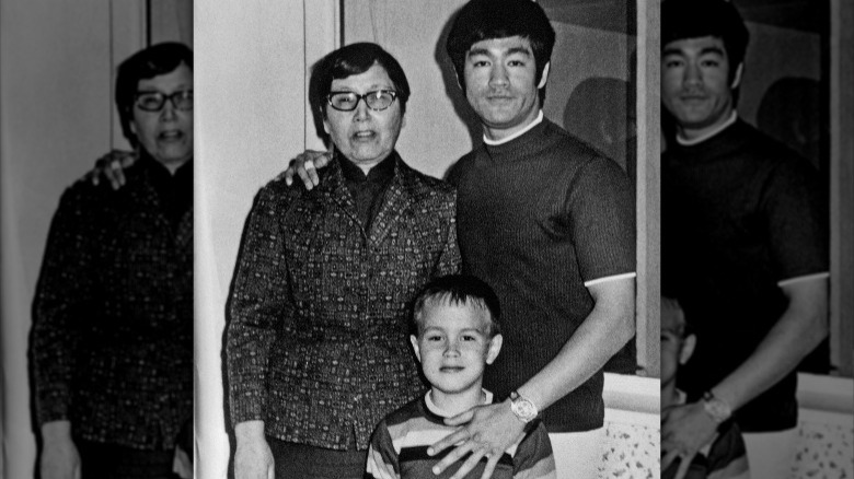 bruce lee with mother and son standing