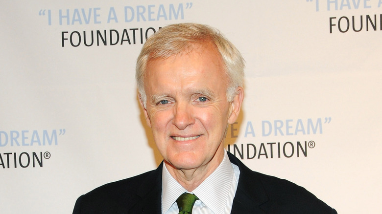 Bob Kerrey smiling in suit