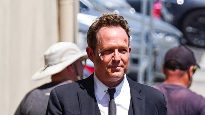 Dean Winters as Mayhem character on street