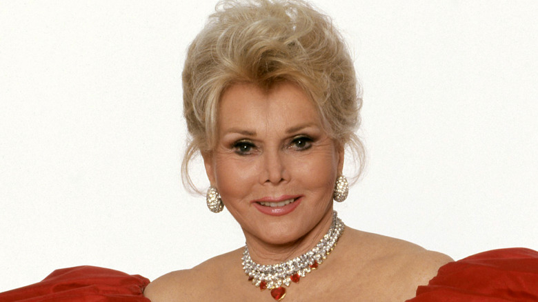 Zsa Zsa Gabor in portrait with red dress and necklace