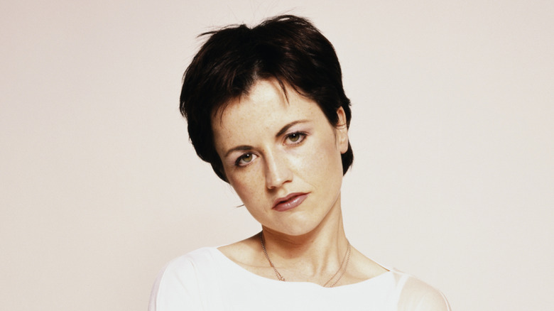Dolores O'Riordan in white in publicity still