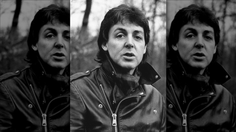 Paul McCartney posing in leather jacket 1980