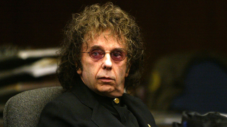 Phil Spector sitting