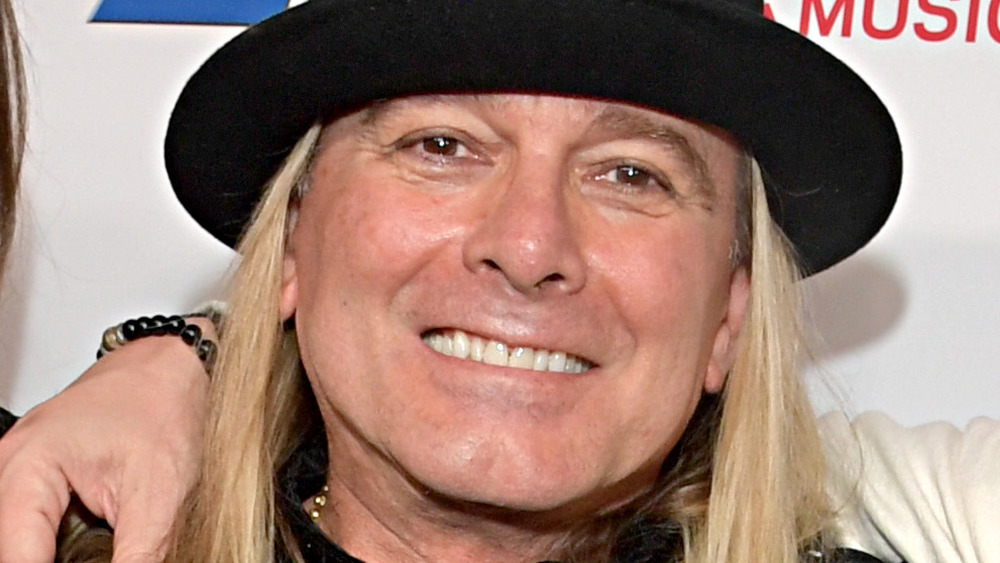 Robin Zander in a top hat