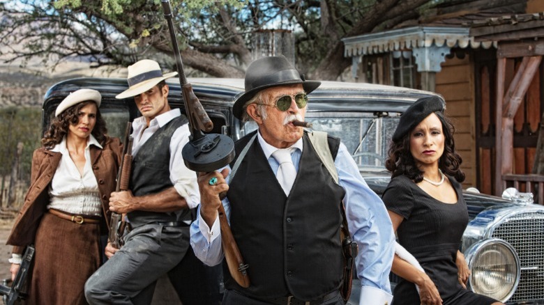 Mobsters holding guns