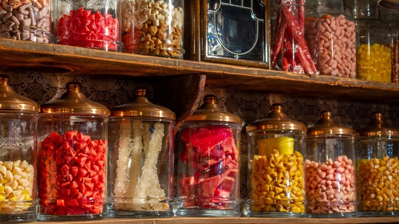 Light shining on jars of candy