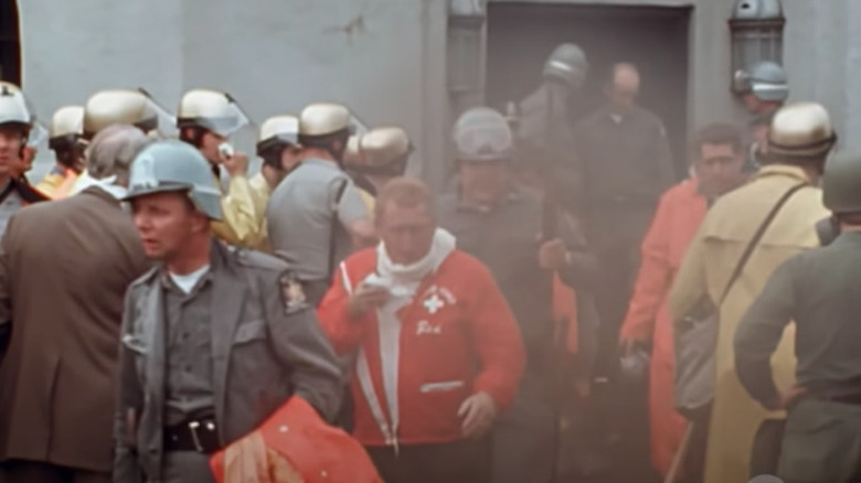 Officers Emerging from Tear Gas 