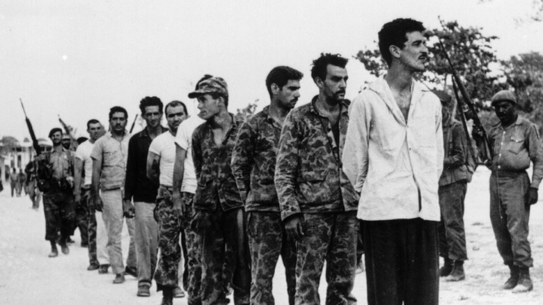 Captured Cuban exiles marching