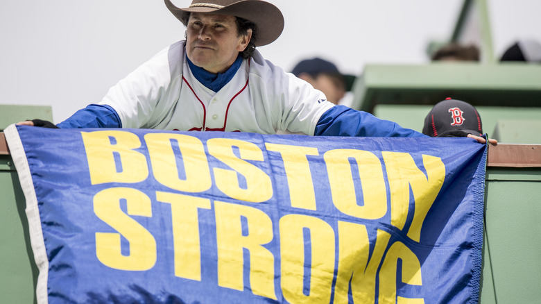 Bombing Survivor Holds Boston Strong Flag