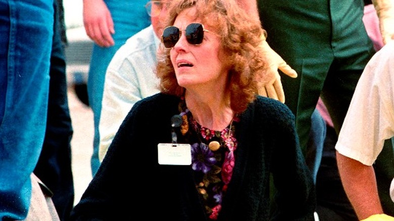 Upset woman with casualty.