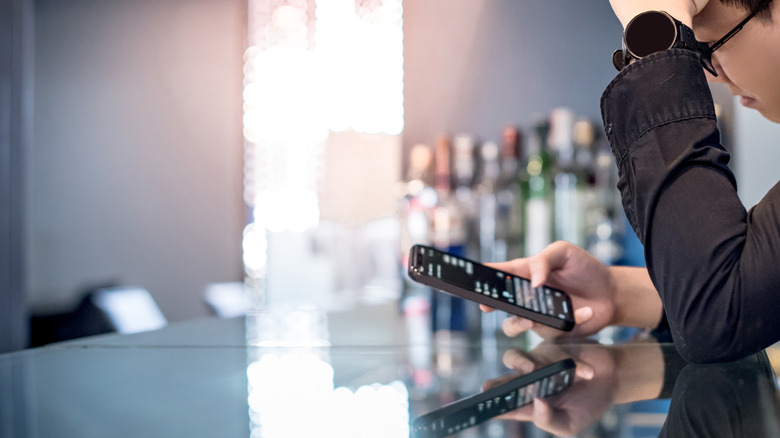 depressed person on a smartphone
