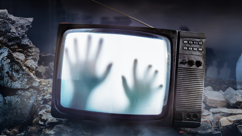 ghostly hands in television set