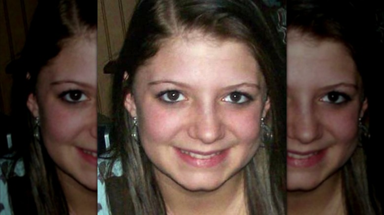 Kayla May Berg smiling while looking at camera