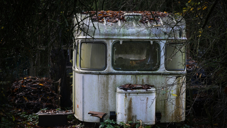 stock photo of abandoned camp trailer