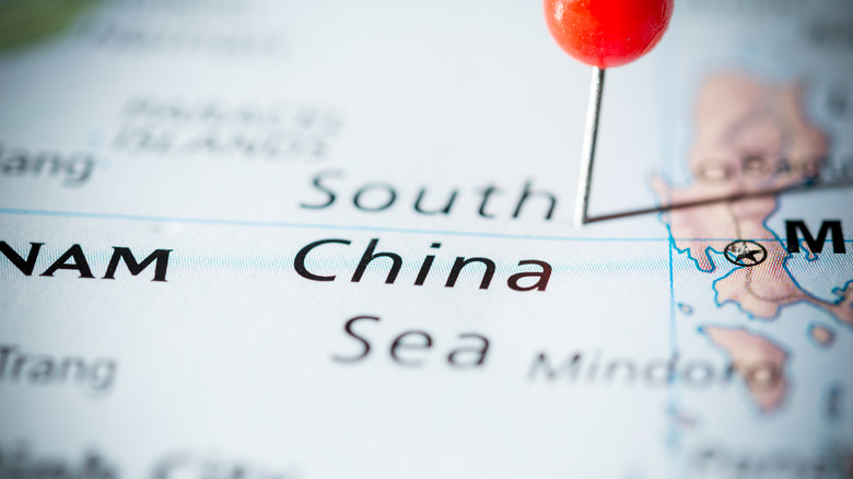 Pin stuck into South China Sea map