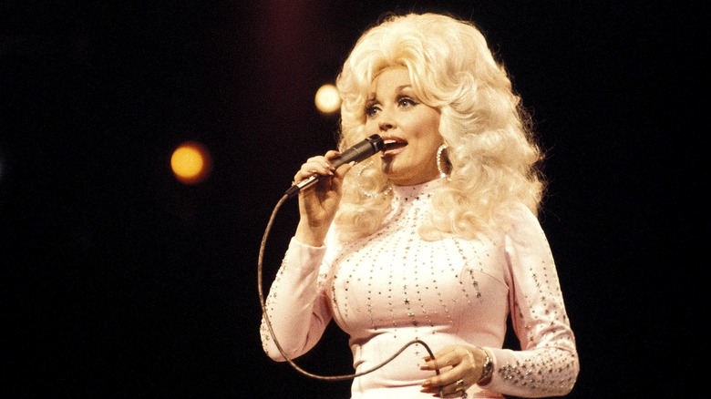 Dolly Parton singing on stage