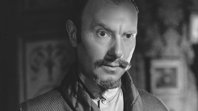 Ralph Richardson in a still from a movie scene