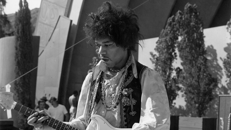 Jimi Hendrix performing