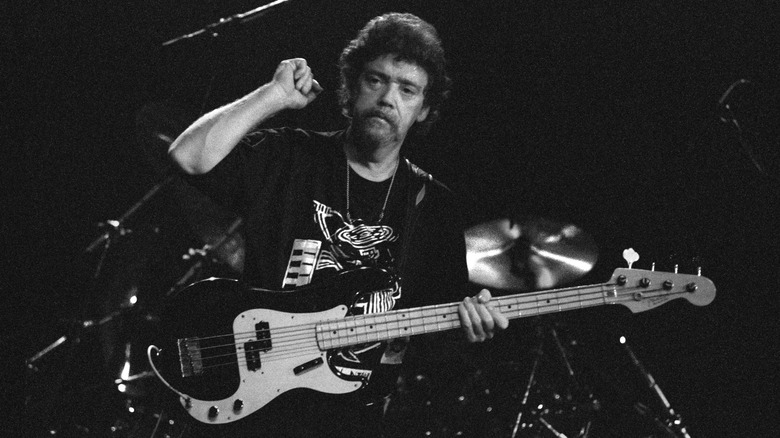 donald duck dunn performing guitar arm raised