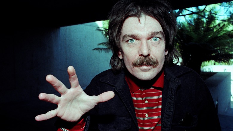 Captain Beefheart hand grasping toward camera