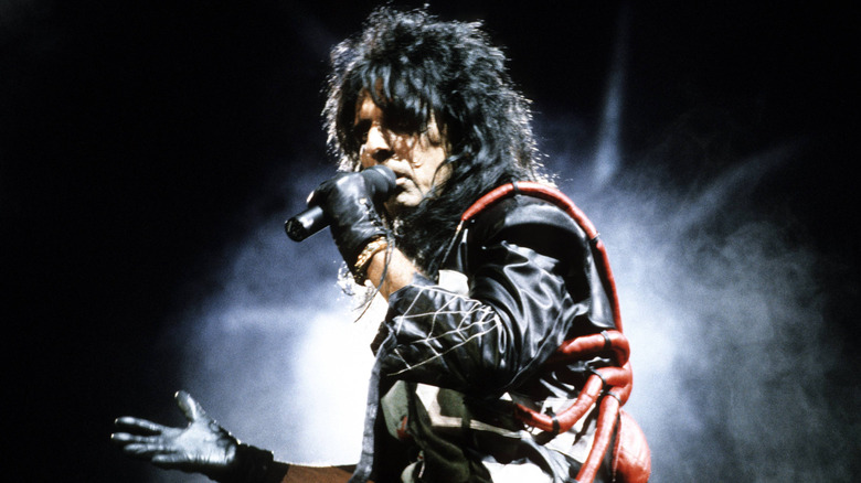 Alice Cooper singing on stage