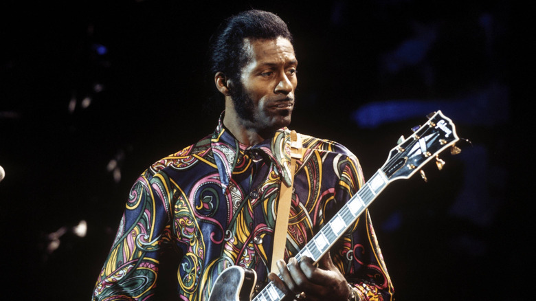 Chuck Berry playing guitar on stage in 1972