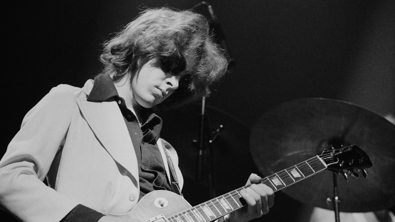 Mick Taylor of the Rolling Stones playing guitar