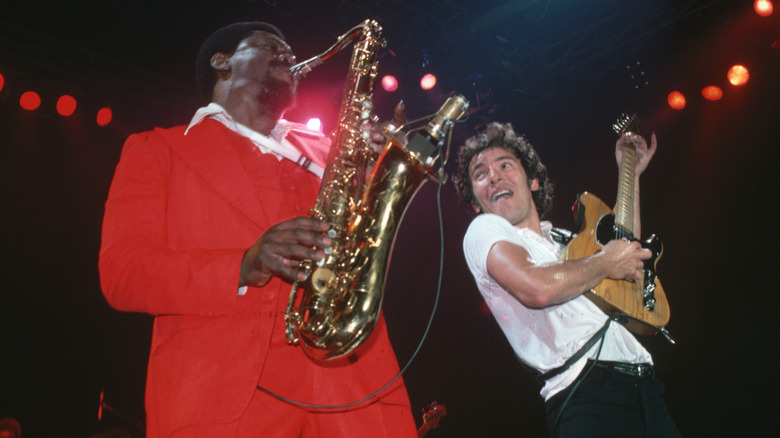 Bruce Springsteen with E Street Band performing on stage
