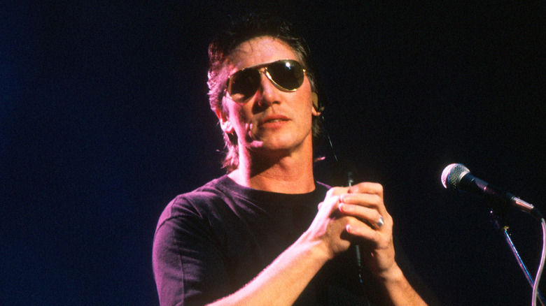 Roger Waters onstage in sunglasses