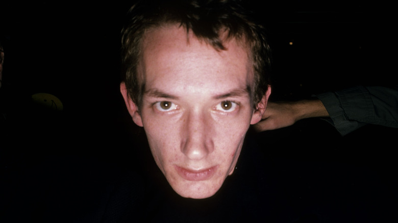 Keith Levene staring up at camera