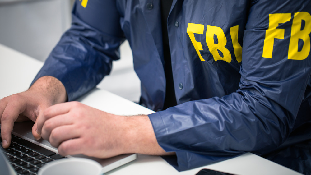 FBI agent at desk
