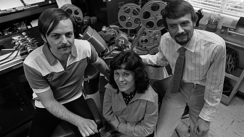 wetzel and the strelzyks smiling in a film lab