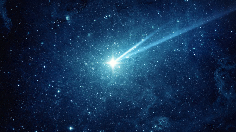 comet streaking past in space