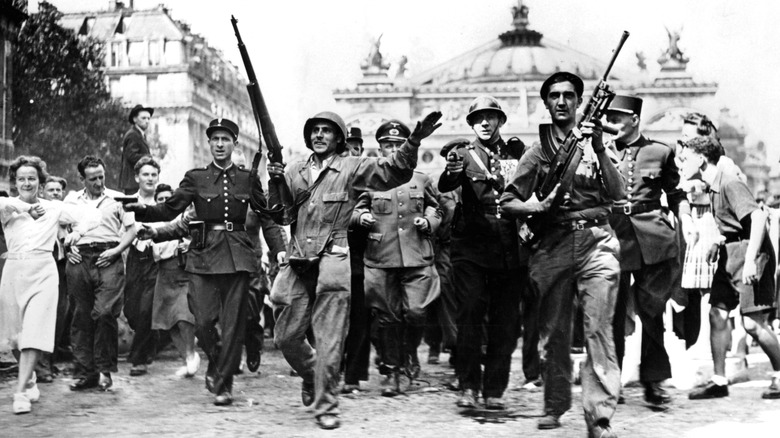 French resistance fighters escort German POWs 