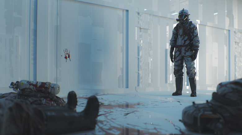 Survivor in containment suit near corpses