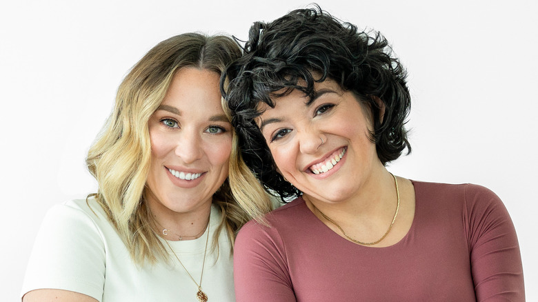 Ashley Flowers and Brit Prawat smiling
