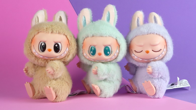 three Labubu dolls