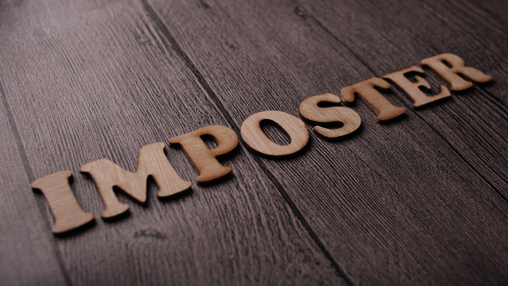 Imposter written out in letters
