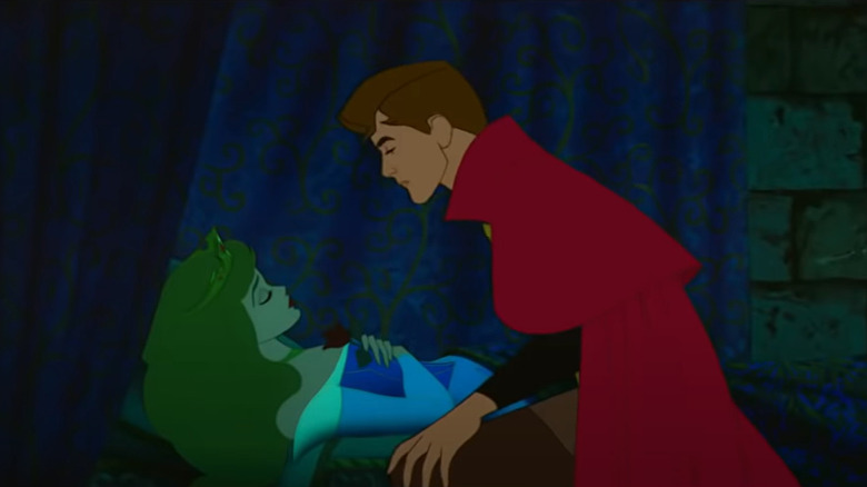 Prince Phillip leaning in to kiss Princess Aurora
