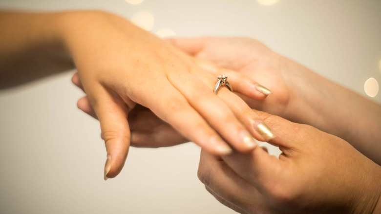 A diamond engagement ring.