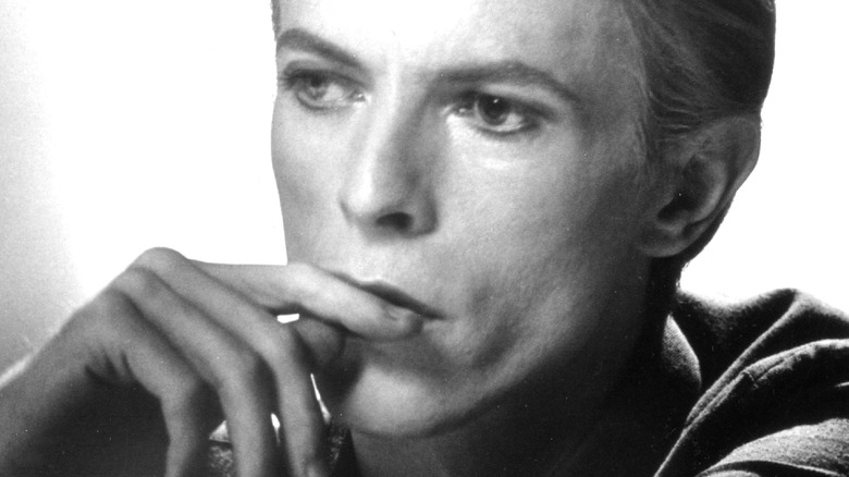 David Bowie hand to face