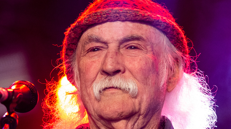 David Crosby staring past mic