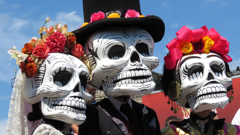 Participants of Dia de los Muertos in death masks